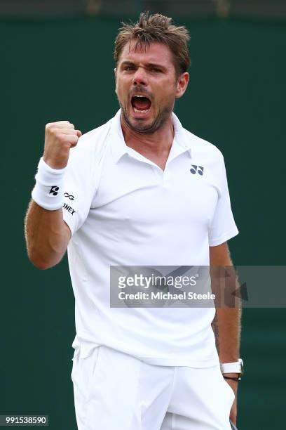Stan Wawrinka of Switzerland celebrates a point against Thomas Fabbiano of Italy during their Men's Singles second round match on day three of the...