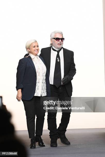 Designer Karl Lagerfeld and Silvia Venturini Fendi acknowledging the applause of the public after the Fendi Haute Couture Fall Winter 2018/2019 show...