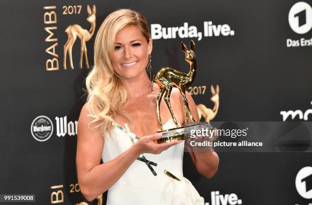 The award winner in the category "Music National", the singer Helene Fischer, can be seen during the awards ceremony of the 69th edition of the Bambi...