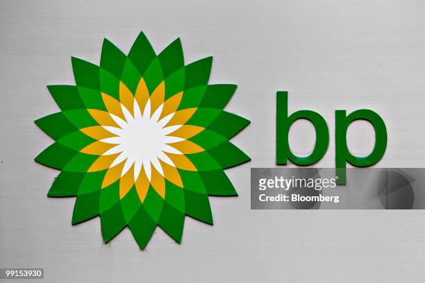 The BP Plc logo is displayed outside the BP Command Center in Houston, Texas, U.S., on Wednesday, May 12, 2010. BP Plc lowered its smaller "top hat"...