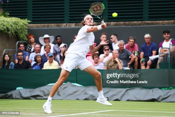 Stefanos Tsitsipas of Greece returns against Jared Donaldson of the United States during his Men's Singles second round match on day three of the...