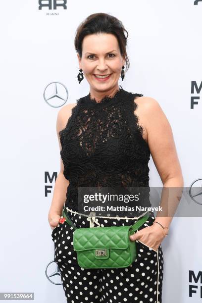 Astrid Rudolph attends the Riani show during the Berlin Fashion Week Spring/Summer 2019 at ewerk on July 4, 2018 in Berlin, Germany.