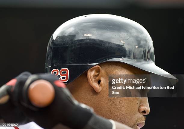 The reflection of the Fenway Park facade is visible in the helmut of Adrian Beltre of the Boston Red Sox before he bats against the Toronto Blue Jays...