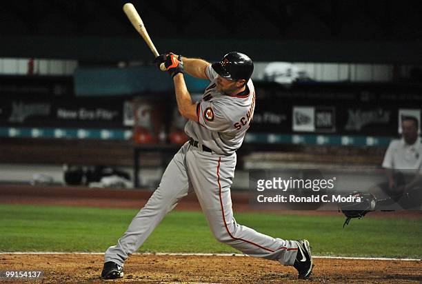 Nate Schierholtz of the San Francisco Giants bats during a MLB game against the Florida Marlins in Sun Life Stadium on May 6, 2010 in Miami, Florida.