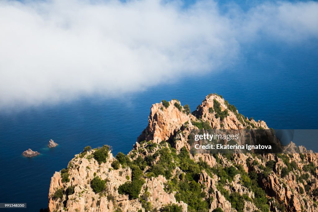 Rock, sea and clouds