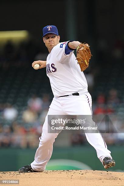 Pitcher Colby Lewis of the Texas Rangers throws against the Oakland Athletics on May 11, 2010 at Rangers Ballpark in Arlington, Texas.