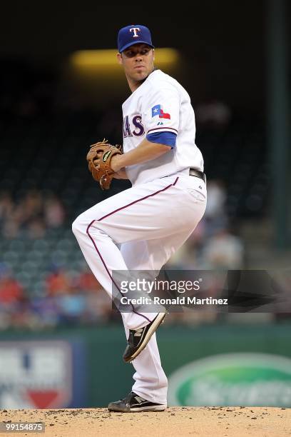 Pitcher Colby Lewis of the Texas Rangers throws against the Oakland Athletics on May 11, 2010 at Rangers Ballpark in Arlington, Texas.
