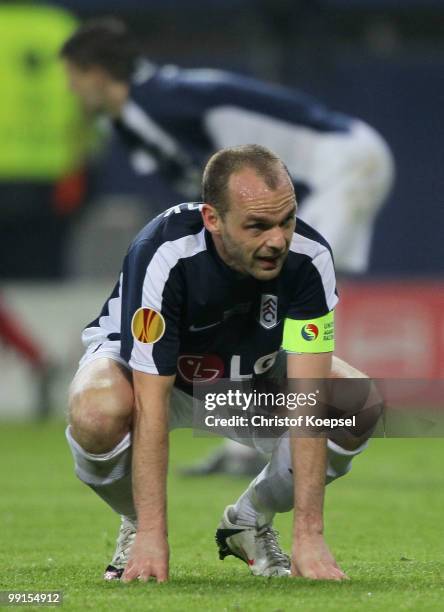 Danny Murphy of Fulham looks dejected after their defeat in the UEFA Europa League final match between Atletico Madrid and Fulham at HSH Nordbank...