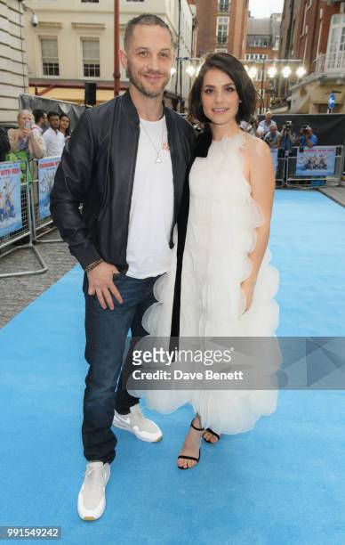 Tom Hardy and Charlotte Riley attend the UK Premiere of "Swimming With Men' at The Curzon Mayfair on July 4, 2018 in London, England.