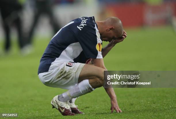 Paul Konchesky of Fulham looks dejected after their defeat in the UEFA Europa League final match between Atletico Madrid and Fulham at HSH Nordbank...