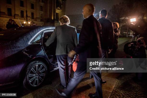 German Chancellor Angela Merkel boarding her limousine after a breakdown in negotiations in Berlin, Germany, 17 November 2017. Representatives from...