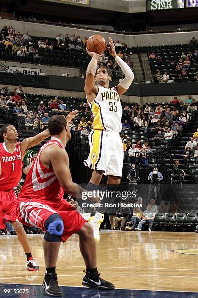 Danny Granger of the Indiana Pacers makes a jumpshot against the Houston Rockets during the game at Conseco Fieldhouse on April 4, 2010 in...