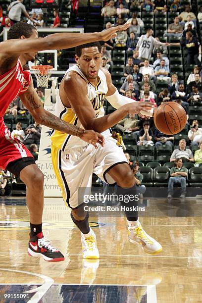 Danny Granger of the Indiana Pacers drives the ball against the Houston Rockets during the game at Conseco Fieldhouse on April 4, 2010 in...