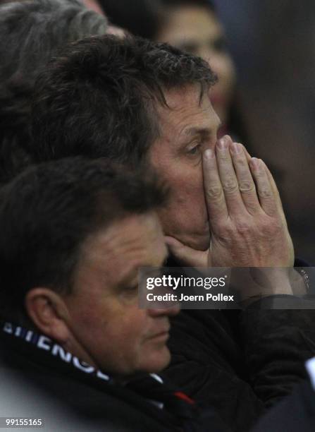 Actor Hugh Grant reacts during the UEFA Europa League final match between Atletico Madrid and Fulham at HSH Nordbank Arena on May 11, 2010 in...