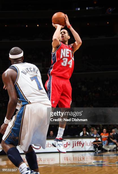Devin Harris of the New Jersey Nets puts a shot up against the Washington Wizards during the game at the Verizon Center on April 4, 2010 in...