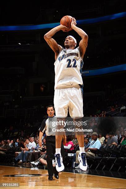 James Singleton of the Washington Wizards puts a shot up against the New Jersey Nets during the game at the Verizon Center on April 4, 2010 in...