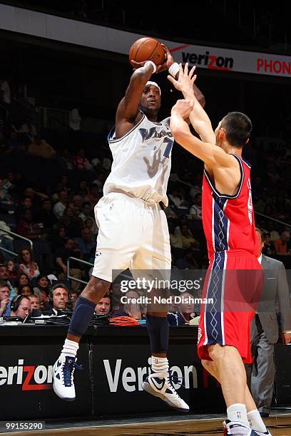 Andray Blatche of the Washington Wizards puts a shot up against the New Jersey Nets during the game at the Verizon Center on April 4, 2010 in...