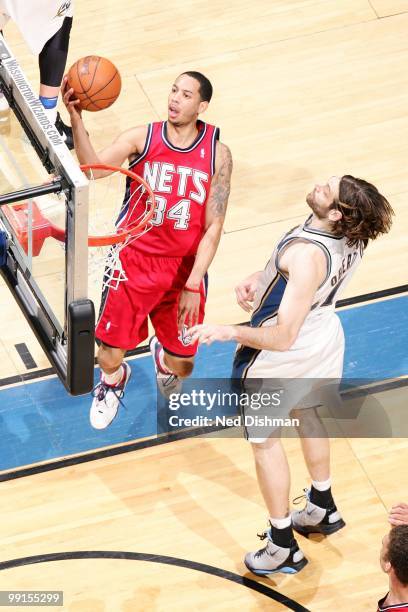 Devin Harris of the New Jersey Nets makes a layup against the Washington Wizards during the game at the Verizon Center on April 4, 2010 in...