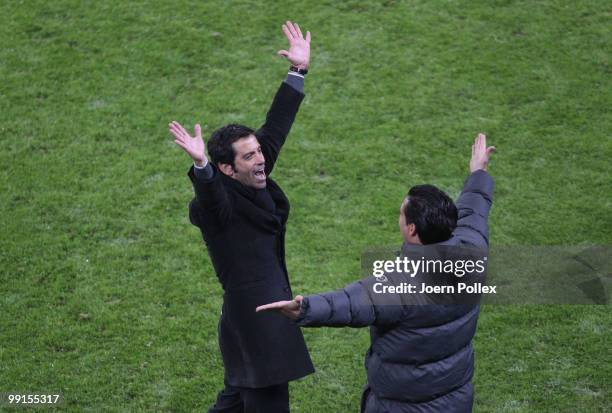 Head coach Quique Sanchez Flores celebrates his team's victory at the end of the UEFA Europa League final match between Atletico Madrid and Fulham at...