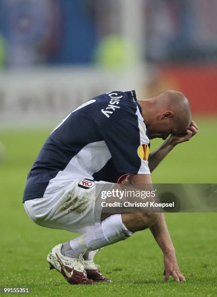 Paul Konchesky of Fulham looks dejected after their defeat in the UEFA Europa League final match between Atletico Madrid and Fulham at HSH Nordbank...