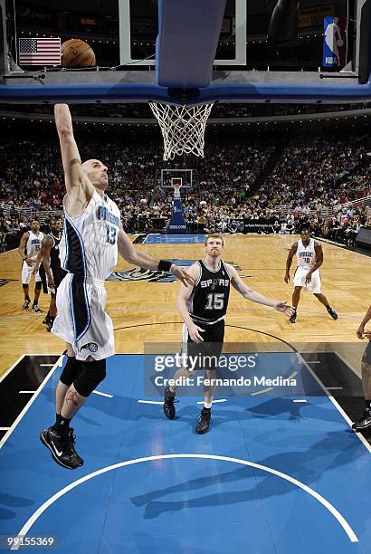 Marcin Gortat of the Orlando Magic makes a layup against the San Antonio Spurs during the game at Amway Arena on March 17, 2010 in Orlando, Florida....