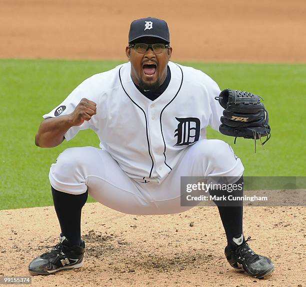 Jose Valverde of the Detroit Tigers yells in celebration of striking out Nick Swisher of the New York Yankees for the final out of the first game of...