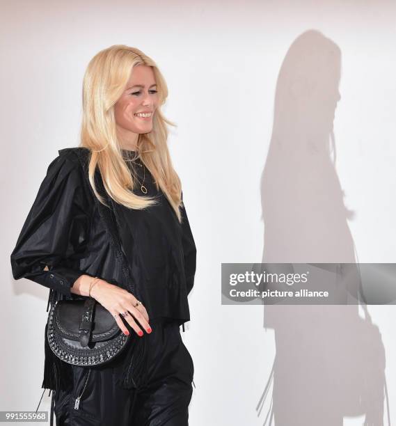 Supermodel Claudia Schiffer arriving to an autograph signing session on the occasion of a photo exhibition on her career taking place in the...