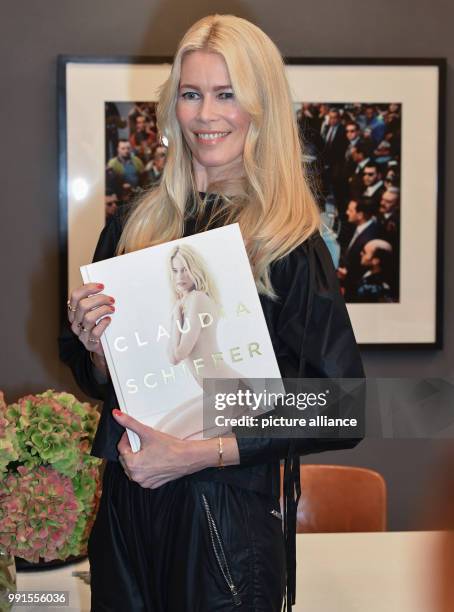 Supermodel Claudia Schiffer arriving to an autograph signing session on the occasion of a photo exhibition on her career taking place in the...