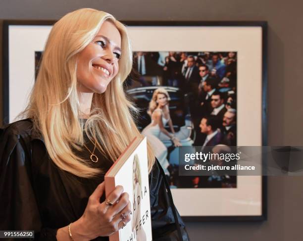 Supermodel Claudia Schiffer arriving to an autograph signing session on the occasion of a photo exhibition on her career taking place in the...