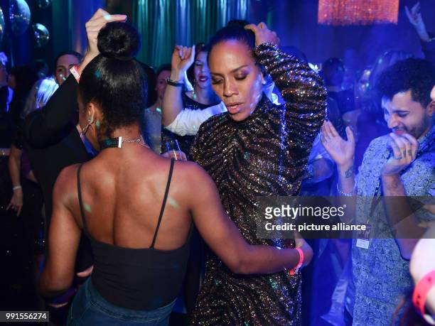 Barbara Becker dancing during the after-party of the 69th edition of the Bambi Awards in Berlin, Germany, 16 November 2017. Photo: Jens Kalaene/dpa