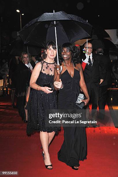 Actress Aissa Maiga and guest attend the Opening Ceremony Dinner at the Majestic Hotel during the 63rd International Cannes Film Festival on May 12,...