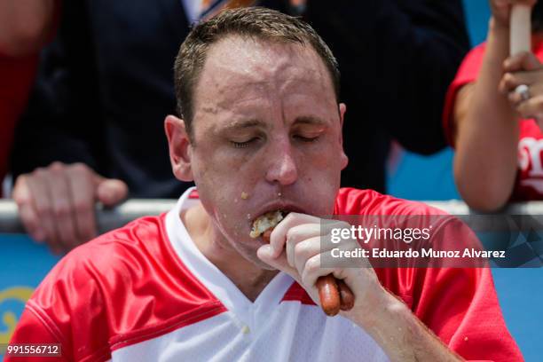 Joey Chestnut competes in the annual Nathan's Hot Dog Eating Contest on July 4, 2018 in the Coney Island neighborhood of the Brooklyn borough of New...