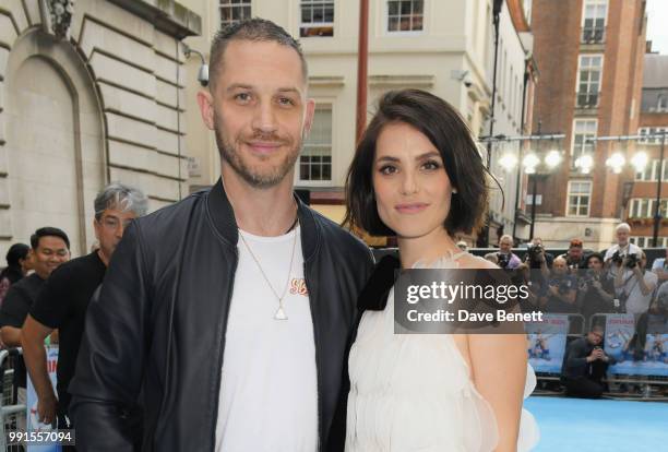 Tom Hardy and Charlotte Riley attend the UK Premiere of "Swimming With Men' at The Curzon Mayfair on July 4, 2018 in London, England.