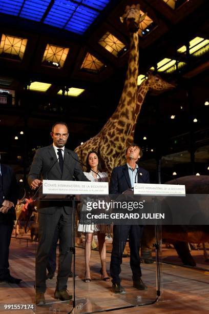 French Prime Minister Edouard Philippe delivers his speech next to French Minister for the Ecological and Inclusive Transition Nicolas Hulot during...