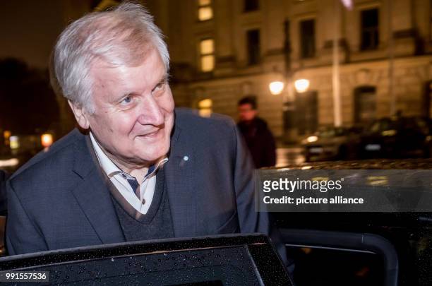 Bavarian State Premier and CSU chairman Horst Seehofer leaves after another session of exploratory talks for the so-called "Jamaika coalition"...