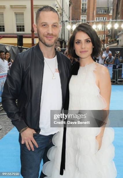 Tom Hardy and Charlotte Riley attend the UK Premiere of "Swimming With Men' at The Curzon Mayfair on July 4, 2018 in London, England.