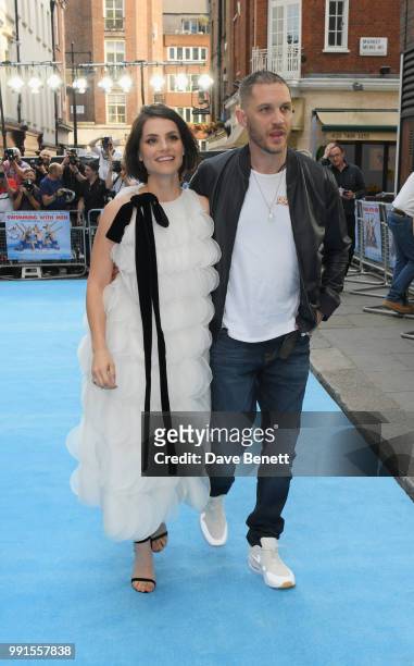 Charlotte Riley and Tom Hardy attend the UK Premiere of "Swimming With Men' at The Curzon Mayfair on July 4, 2018 in London, England.