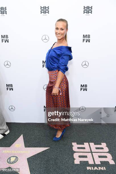 Sina Tkotsch attends the Riani show during the Berlin Fashion Week Spring/Summer 2019 at ewerk on July 4, 2018 in Berlin, Germany.