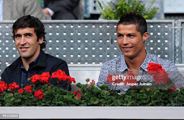 Cristiano Ronaldo and Raul Gonzalez of Real Madrid smile during the second round match between Rafael Nadal of Spain and Oleksandr Dolgopolov of...