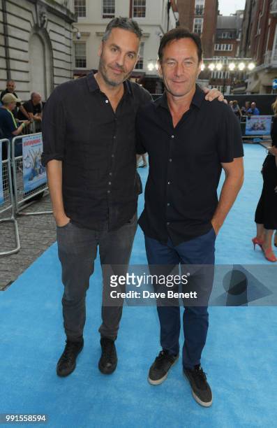 Ol Parker and Jason Isaacs attend the UK Premiere of "Swimming With Men' at The Curzon Mayfair on July 4, 2018 in London, England.
