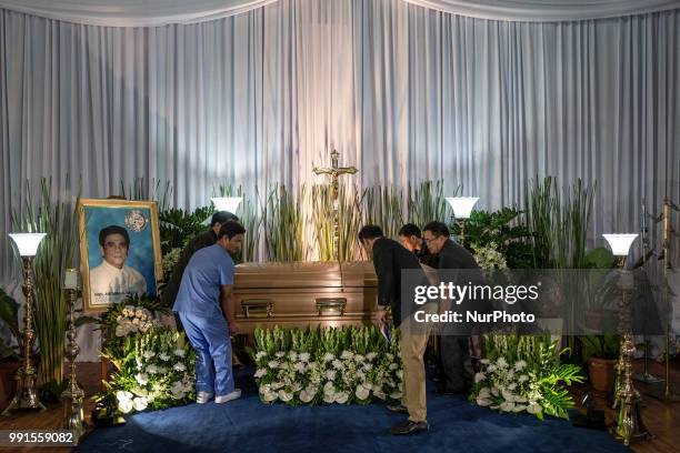 The coffin carrying the remains of Tanauan Mayor Antonio Halili, who was assassinated by a suspected gunman while taking part in a flag raising...