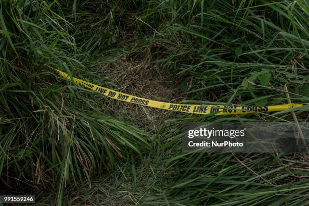 Police tape cordons of the area presumably where a suspected gunman positioned and assassinated Tanauan Mayor Antonio Halili, who was taking part in...