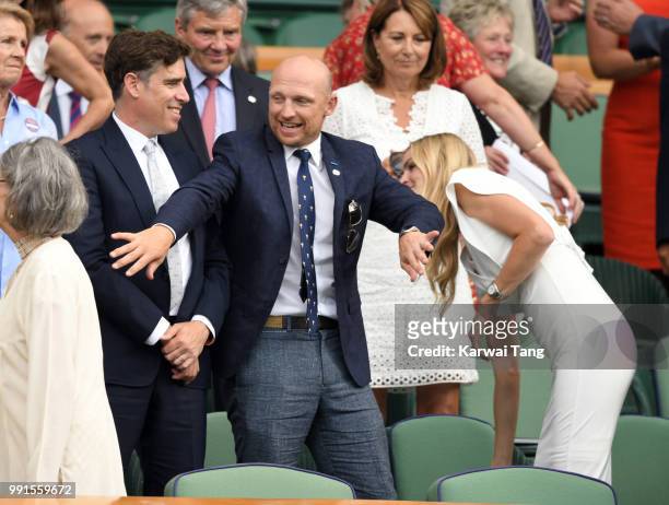 Stephen Mangan, Matt Dawson and wife Carolin Hauskeller in the royal box on day three of the Wimbledon Tennis Championships at the All England Lawn...