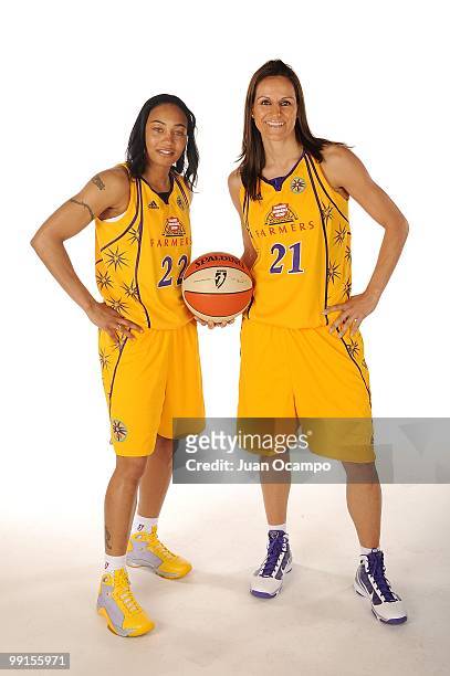 Betty Lennox and Ticha Penicheiro of the Los Angeles Sparks pose for a portrait during WNBA Media Day on May 10, 2010 at St. Mary's Academy in...
