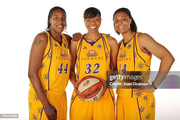 Tiffany Stansbury, Tina Thompson and Lindsay Wisdom-Hylton of the Los Angeles Sparks pose for a portrait during WNBA Media Day on May 10, 2010 at St....