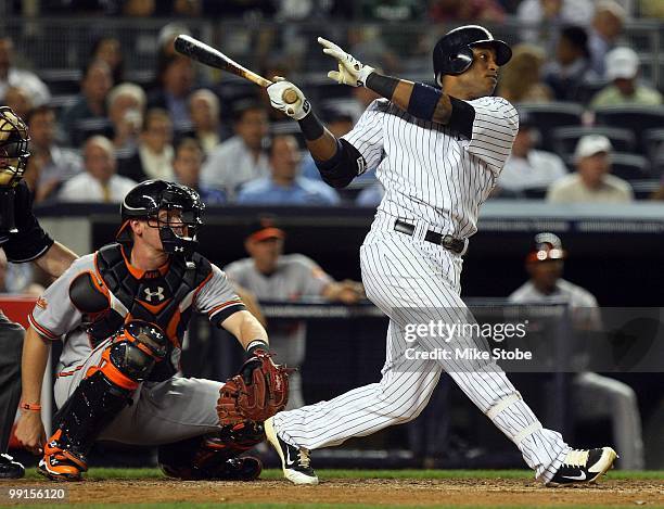 Robinson Cano of the New York Yankees bats against the Baltimore Orioles on May 4, 2010 in the Bronx borough of New York City. The Yankees defeated...