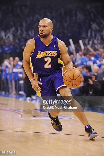 Derek Fisher of the Los Angeles Lakers drives against the Oklahoma City Thunder in Game Six of the Western Conference Quarterfinals during the 2010...
