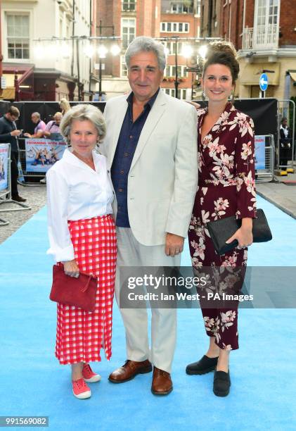 Imelda Staunton, Jim Carter and Bessie Carter attending the Swimming with Men premiere held at Curzon Mayfair, London.