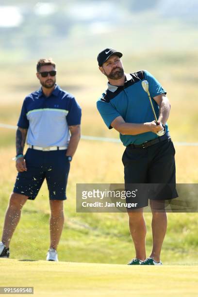 Brian McFadden and Keith Duffy in action during the pro am ahead of the Dubai Duty Free Irish Open at Ballyliffin Golf Club on July 4, 2018 in...