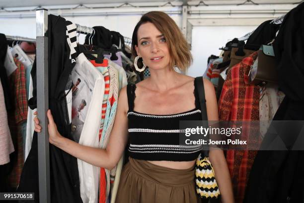 Eva Padberg is seen backstage ahead of the Riani show during the Berlin Fashion Week Spring/Summer 2019 at ewerk on July 4, 2018 in Berlin, Germany.